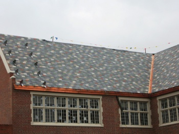 An asphalt roof on Monroe School by Jim Grey